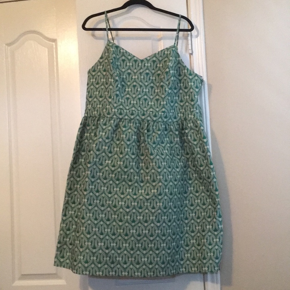 Green and white brocade dress